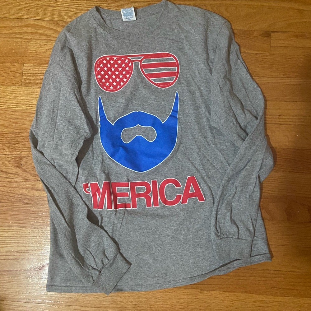 ‘Merca T-Shirt Long Sleeve. Unisex.